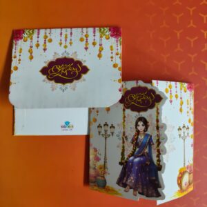 Traditional Half Saree invitation beautifully designed with a rich and graceful royal touch.