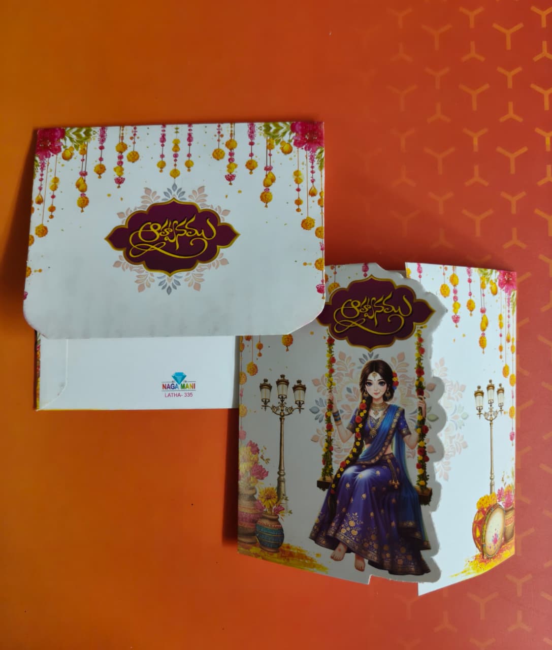 Traditional Half Saree invitation beautifully designed with a rich and graceful royal touch.